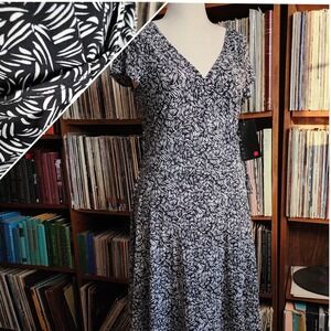Black and white wrap dress NEW with tags by Scarlett short sleeve, deep v, midi